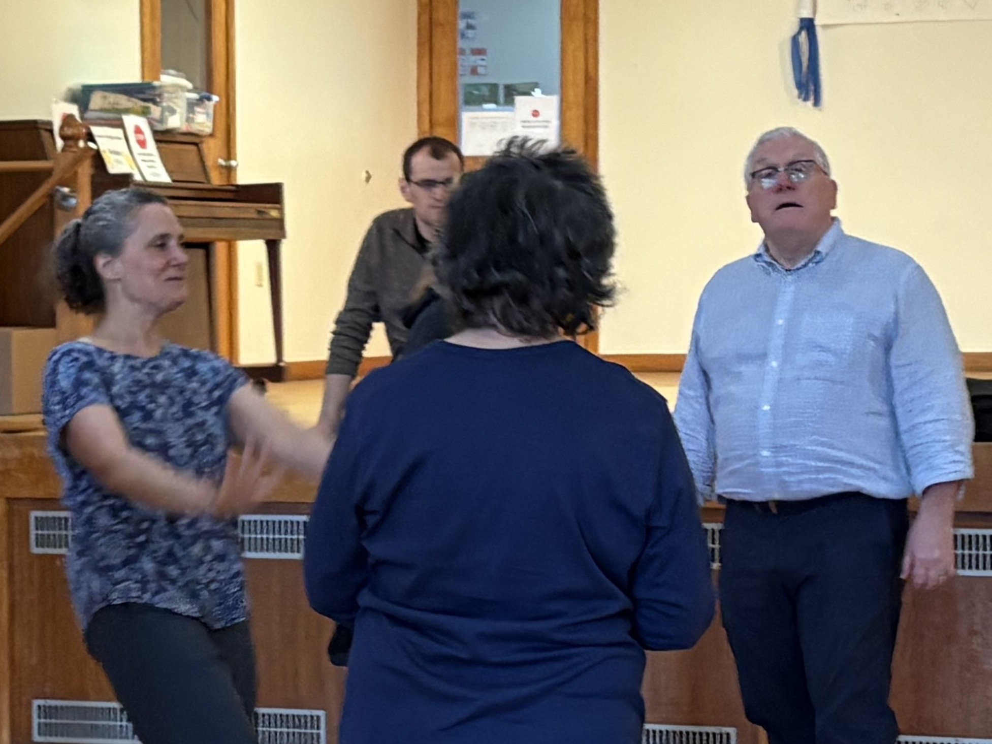 Presenter William Bauer (right) leads participants in Move to the Music! An Exploration of Choral Singing via Rhythm and Movement, at the Reformed Church of Highland Park, March 21, 2026.