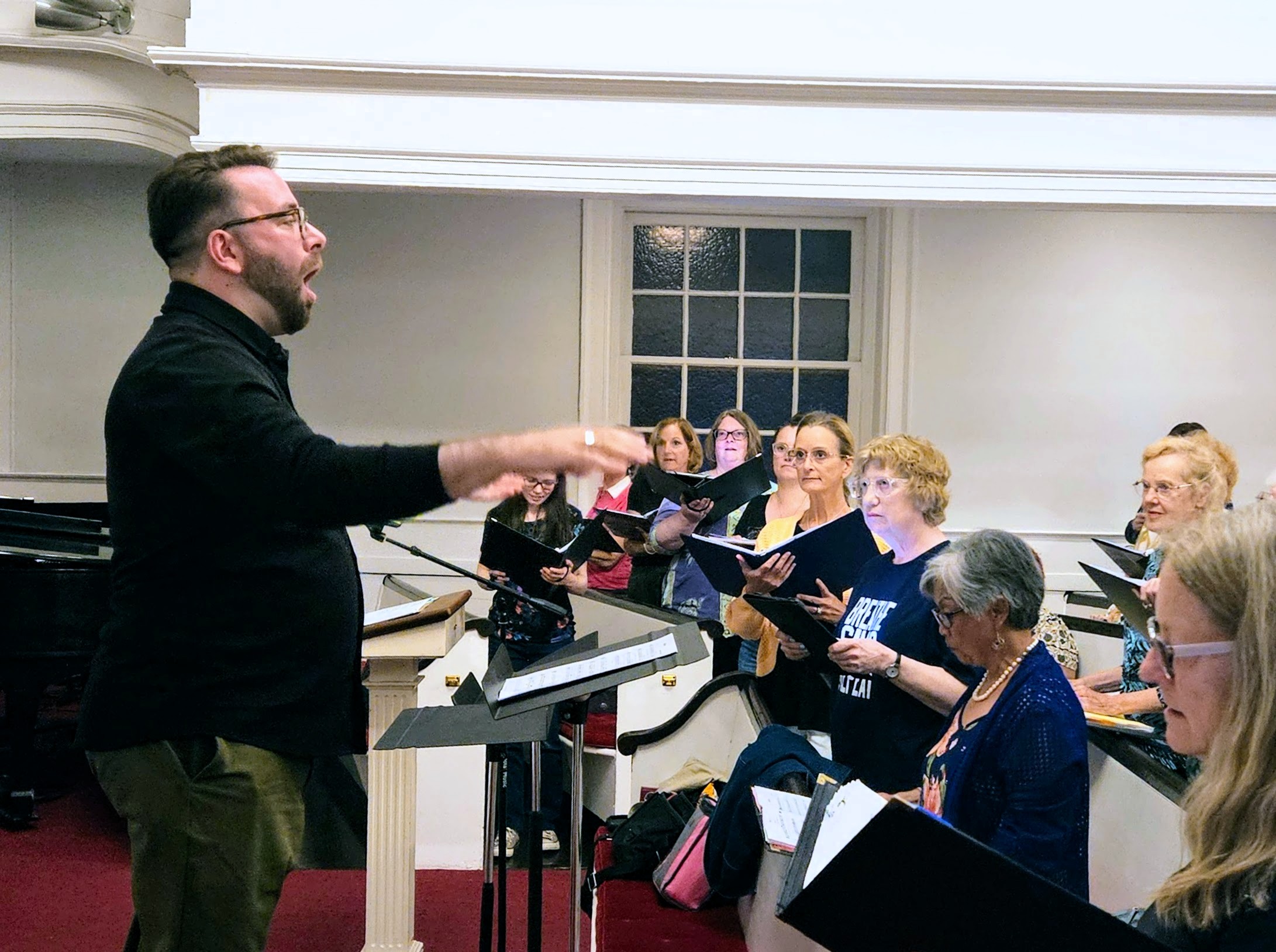 Guest conductor Matthew Zabiegala leads participants at the Big NJ Sing! on July 7, 2026, at First Presbyterian Church in Metuchen.